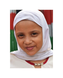 A portrait of a child from a Play Lab